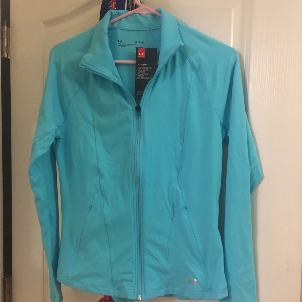 New under Armour blue jacket. Fits very nicely